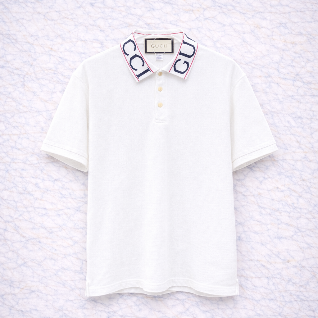 Gucci – Polo Blanc Col GG Brodé